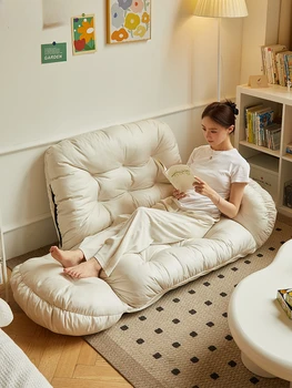 Ленивый диван, на котором можно спать и прилечь, односпальный коврик-татами, общая гостиная, складные подушки, небольшие квартирные кресла с откидной спинкой.